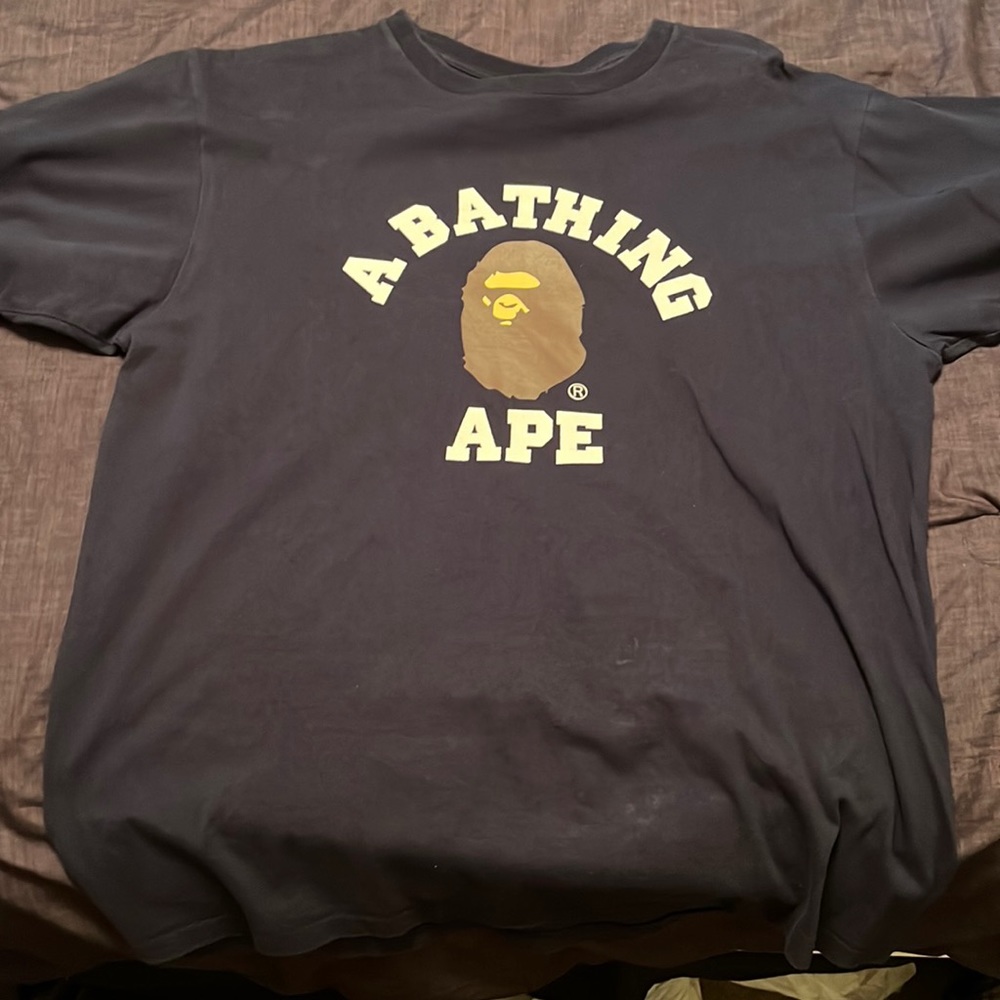 Bathing Ape navy blue shirt and it’s a XL